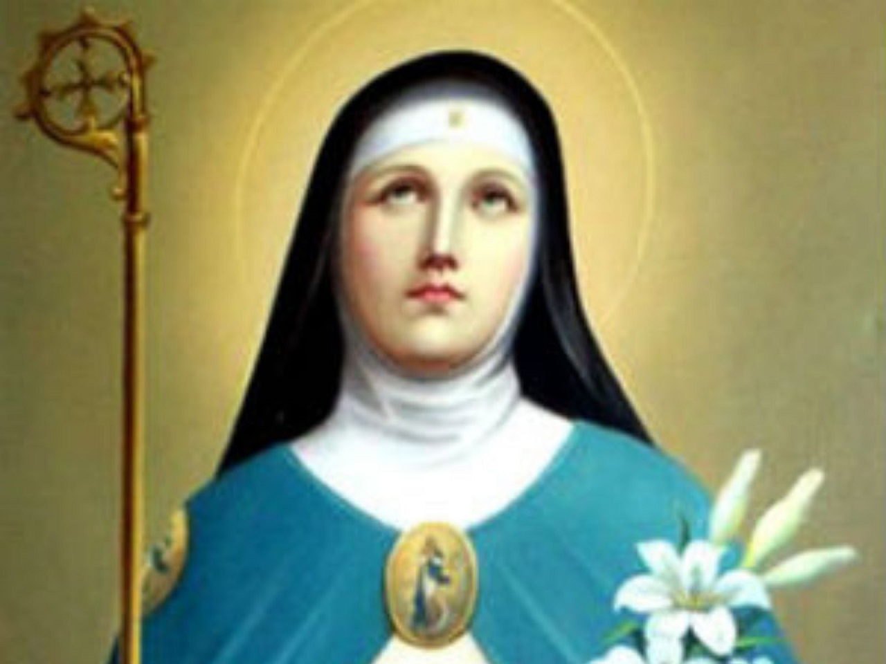 imagem de Santa Beatriz olhando para o céu e segurando um lírio em suas mãos